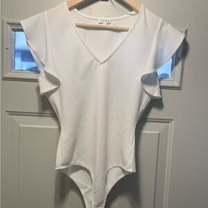 Women's size L white body suit. Only worn ONCE. Basically brand new and in great